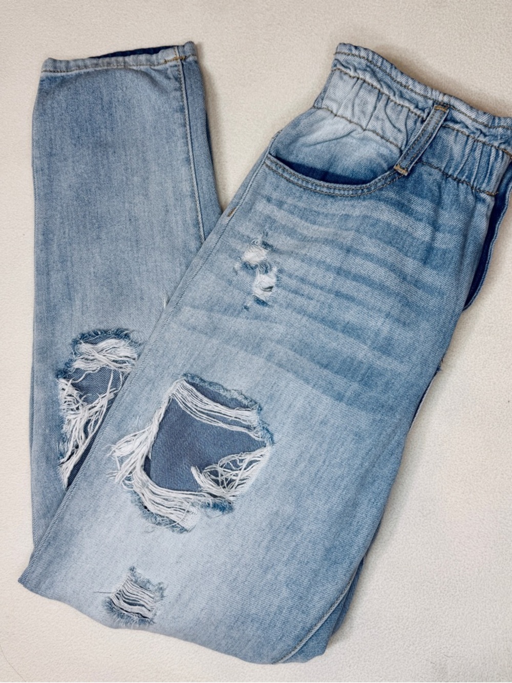 KanCan light wash high rise ruched waist distressed straight leg jeans size 3/25